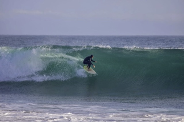 Surfer in a barrel at Santa Cruz
